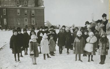 Students of the small boarding school in the yard of Mont Sainte-Agnès
