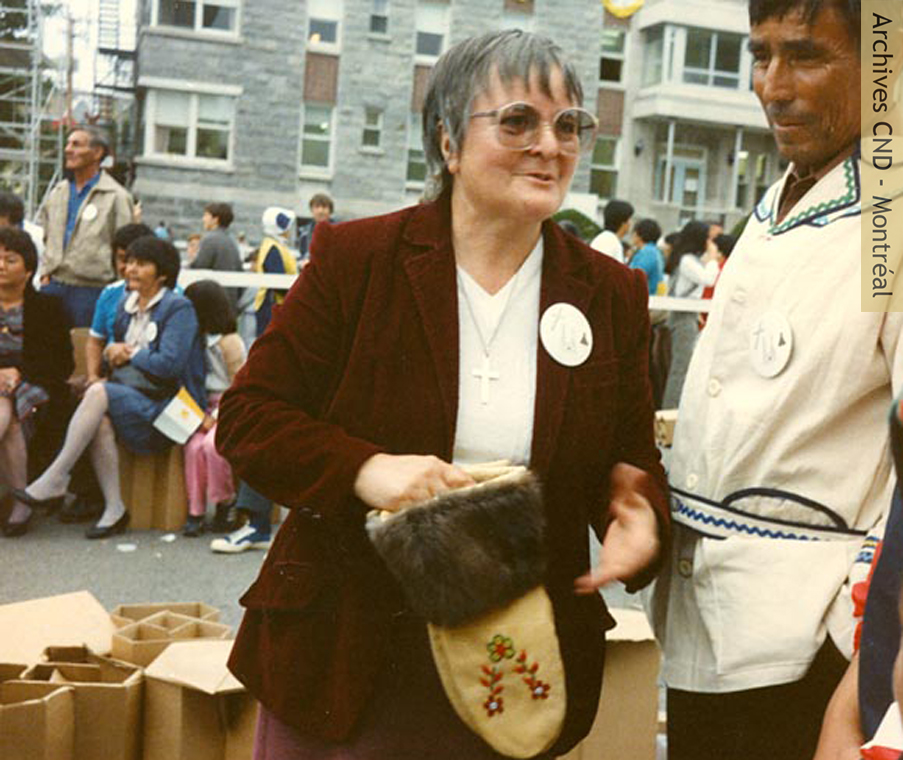 Sister Carmen Chatigny (Saint-Dominique-Savio) with other residents of La Romaine (now the Unamen Shipu Innu Reserve) during the Popes visit with the Amerindian people