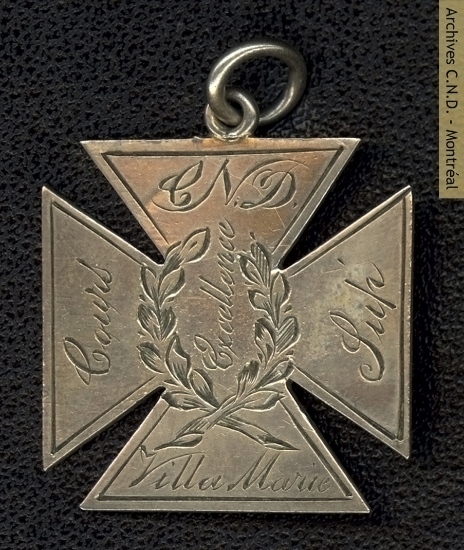 Medalla de Excelencia entregada a Señorita E. Archambault, diplomada del curso superior del Internado Villa María